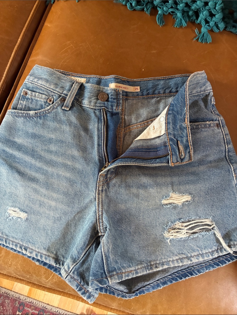 Levi's Light Blue Distressed Denim Shorts